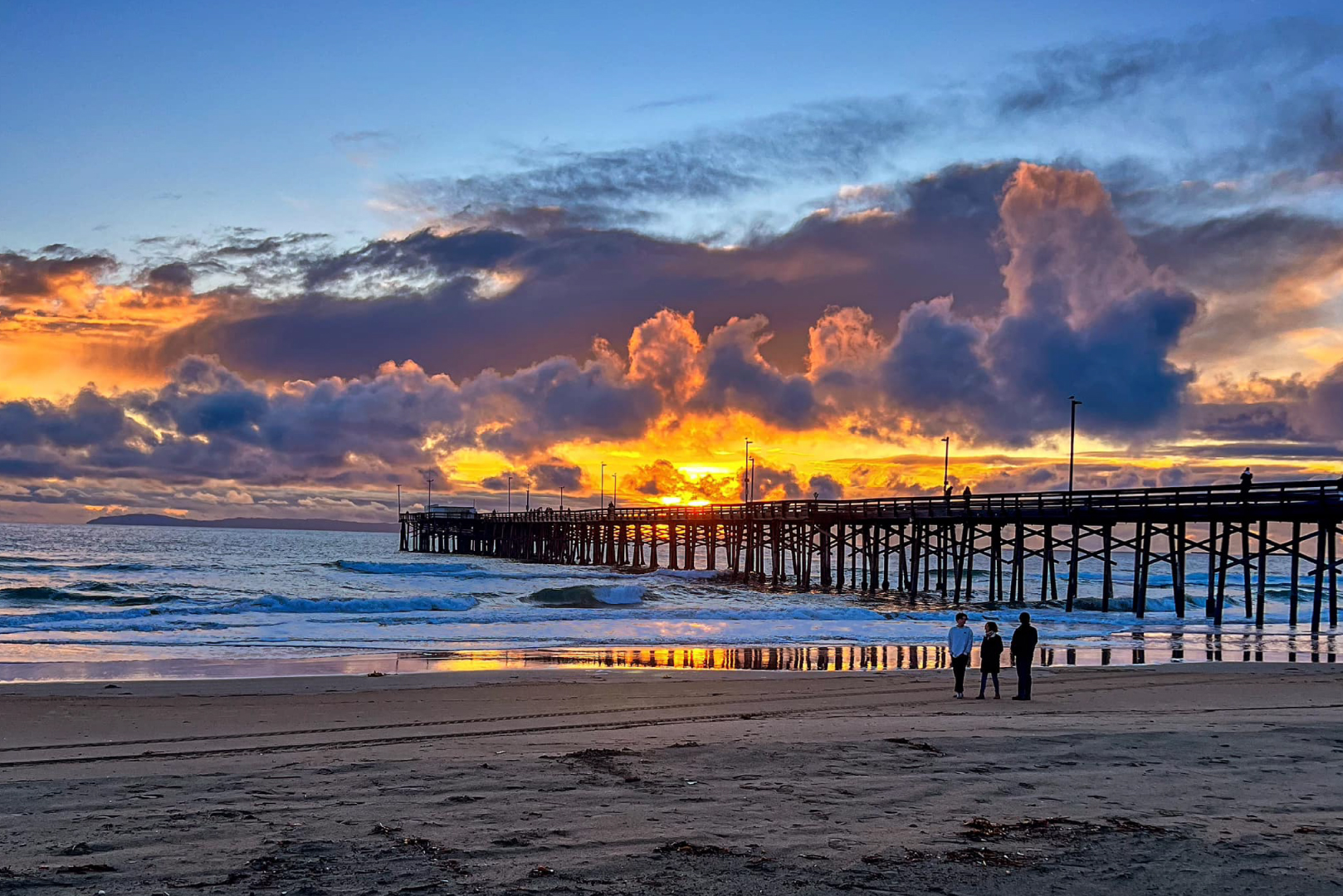 A spectacular view of Balboa Pier at sunset