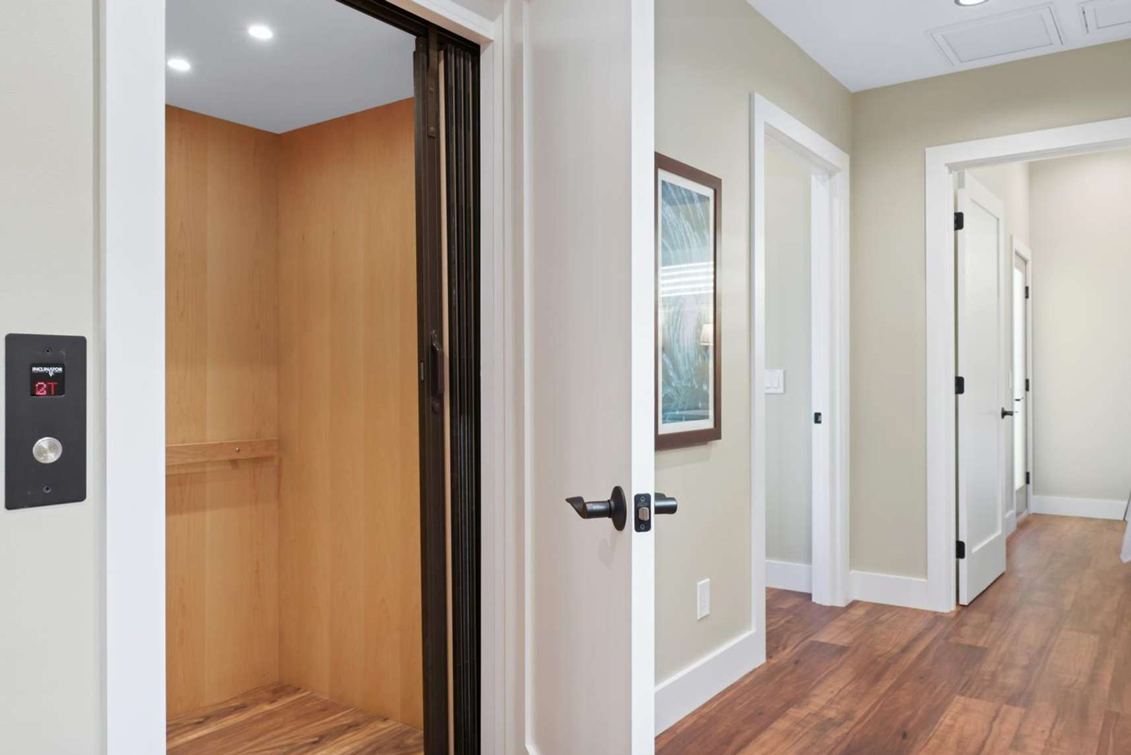 A view of the 2nd floor stair landing including the elevator