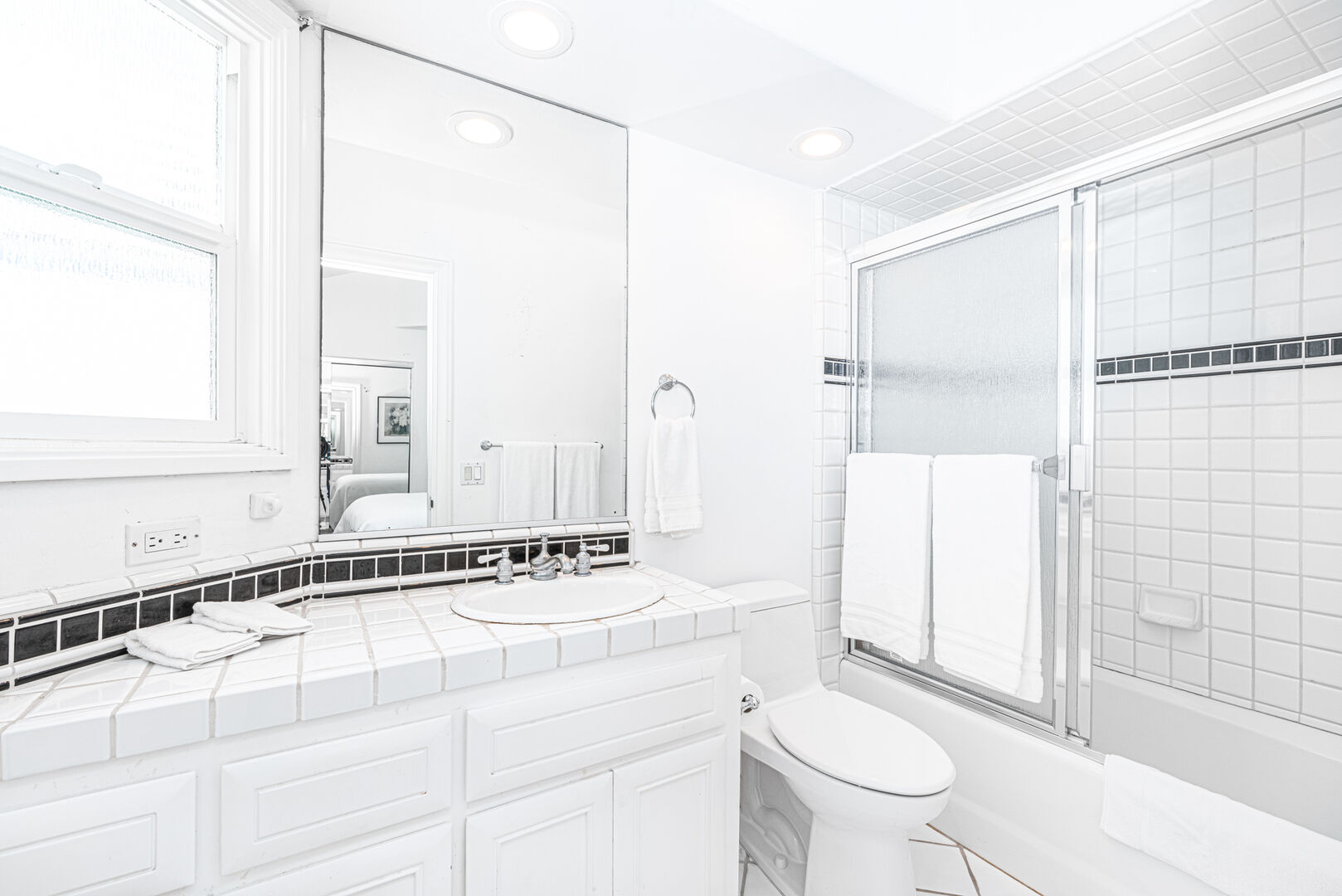 A view of the attached bathroom to guest room 2