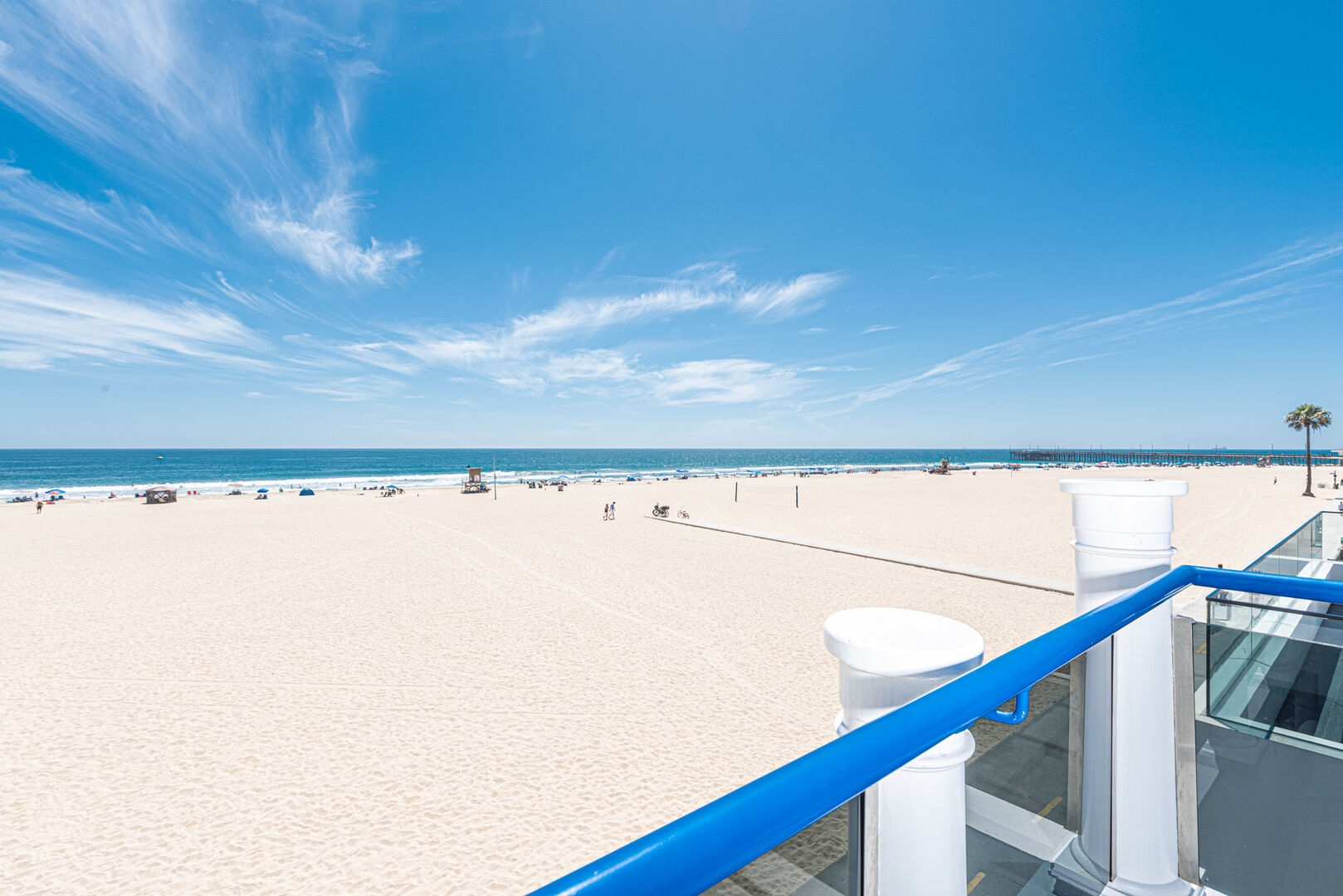 A view of the beach looking towards Newport Pier from the roof lanai