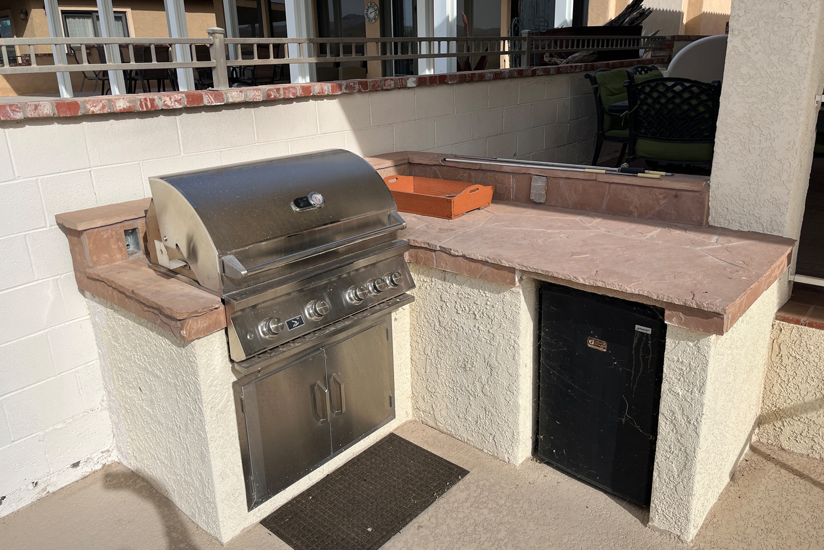 A view of the built in barbeque on the river lanai