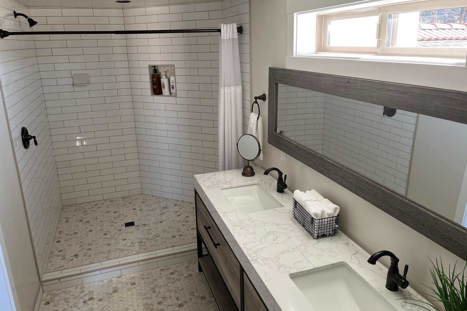 Another view of the bathroom connected to the bunk room