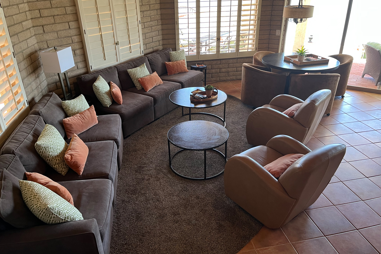 A view of the living area adjacent to the dining area and kitchen
